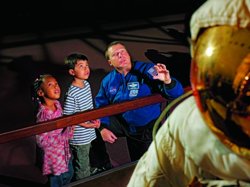 astronaut meets children