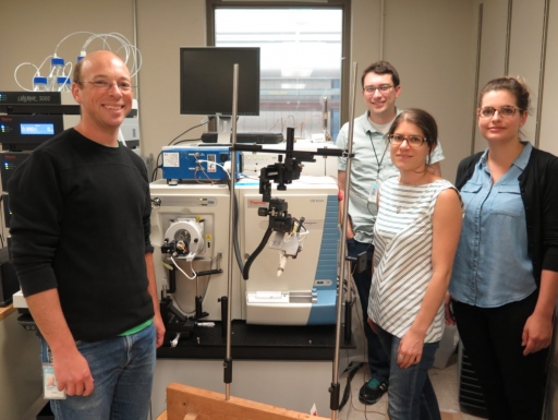 Proteomics group with equipment.