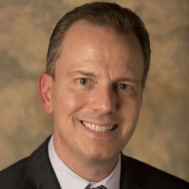 Deron Burba headshot.