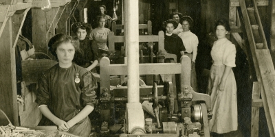 Women in Clothing Industry clothes pin room
