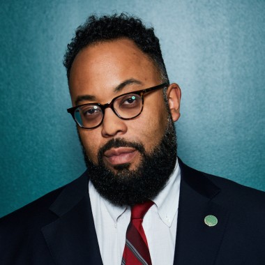 Kevin Young with head titled